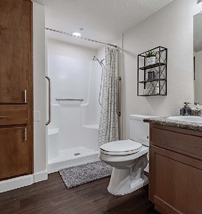 A bathroom with a toilet, sink, and shower. AI generated content